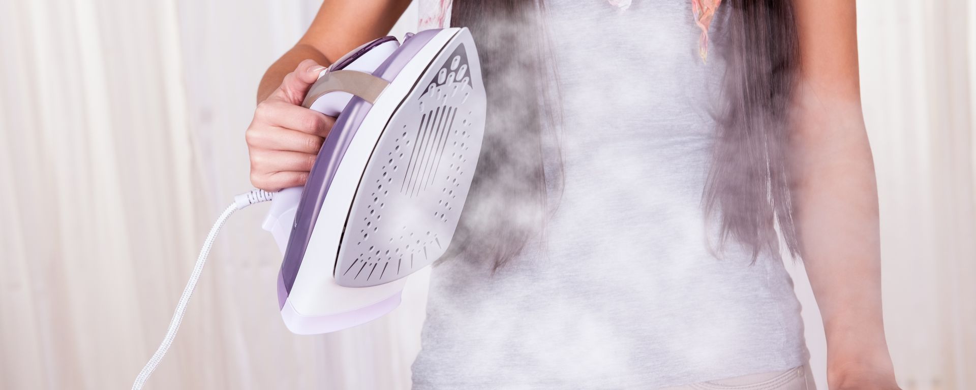 How to clean the steam holes of an iron