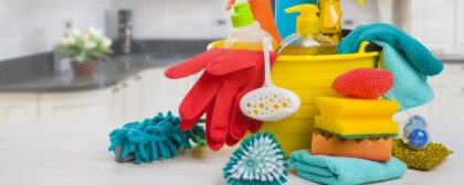 Assortment of cleaning tools on a kitchen surface