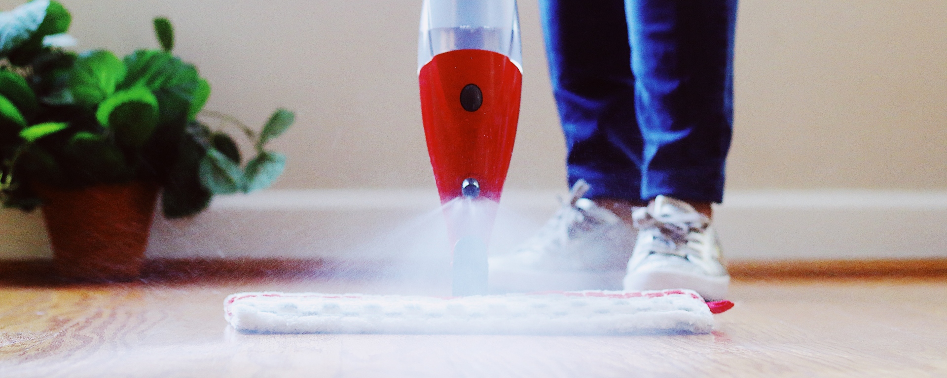 Steam cleaner cleaning a floor